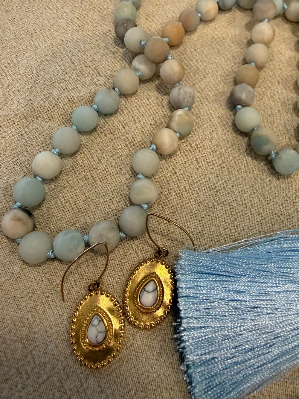 Blue tassel knotted stone bead necklace gold tone marbled drop earring set